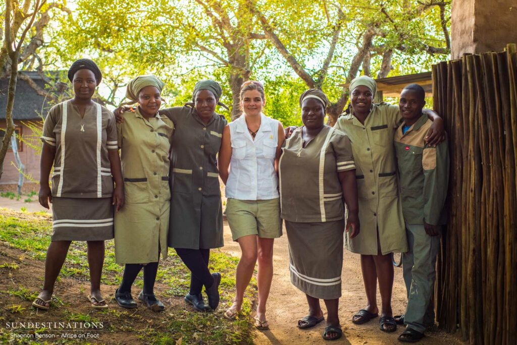 Kitchen and housekeeping staff with camp manager, Jen