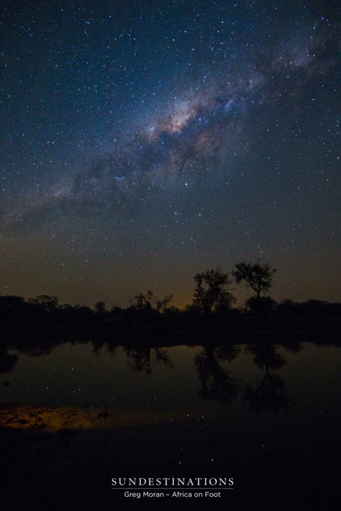An impeccable display of the night skies being reflected in the silent water An impeccable display of the night skies being reflected in the silent water