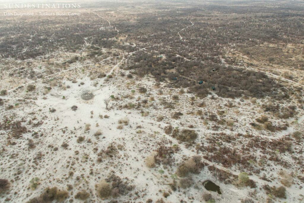 An aerial shot of T6 Pan 100m in front of the 6th guest tent visible in the background An aerial shot of T6 Pan 100m in front of the 6th guest tent visible in the background