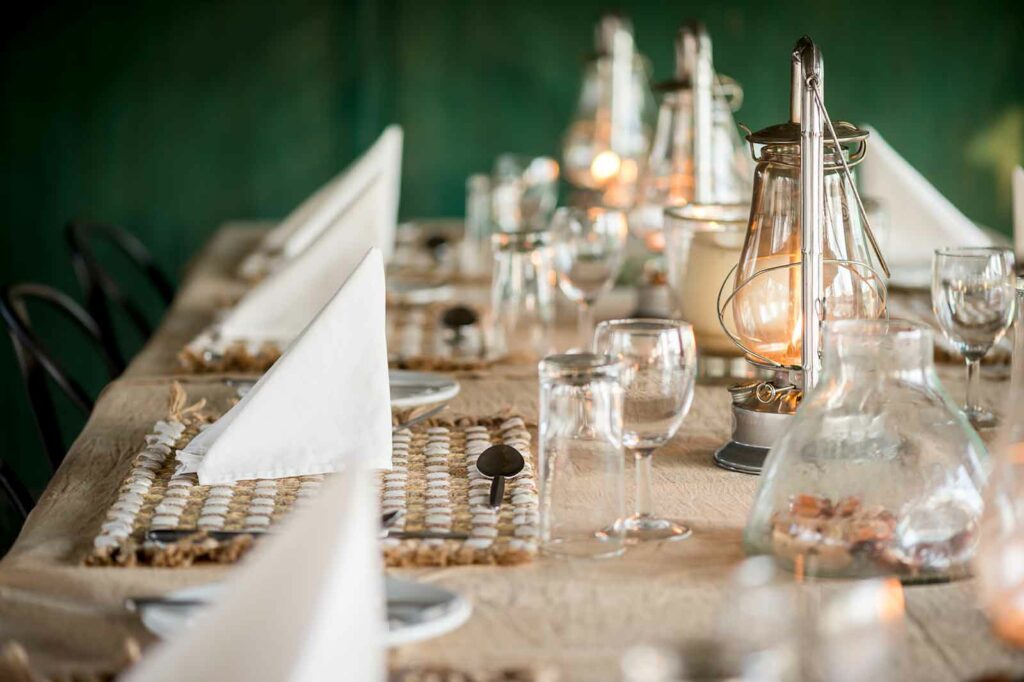 Dinner table setting at Tuskers Bush Camp Dinner table setting at Tuskers Bush Camp