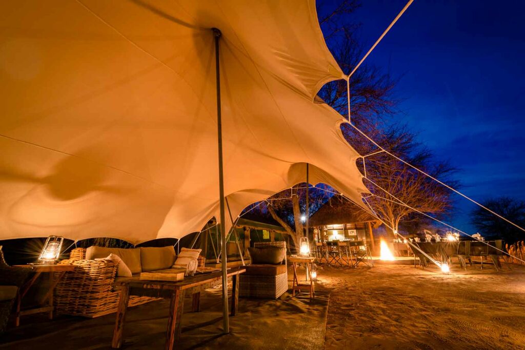 Tented lounge overlooking open plains with a pan Tented lounge overlooking open plains with a pan