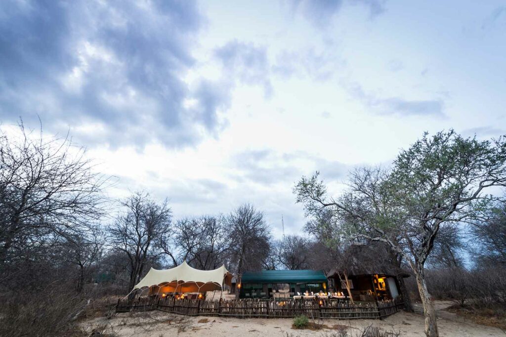 Tuskers Bush Camp main camp area with thatched bar-lounge and tented outdoor lounge area Tuskers Bush Camp main camp area with thatched bar-lounge and tented outdoor lounge area