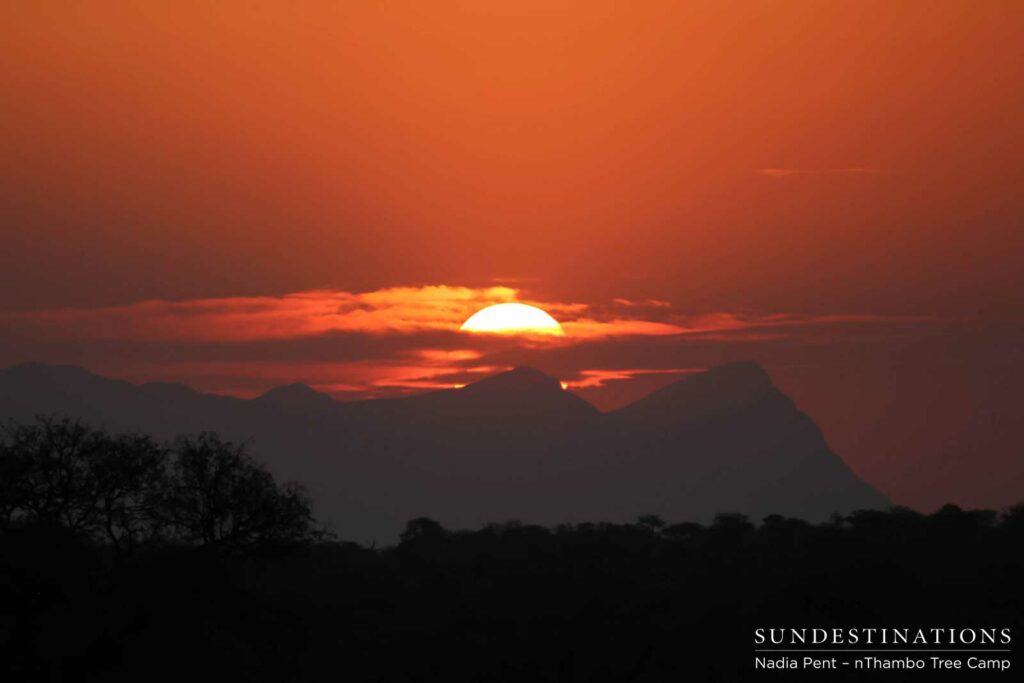 A lava like sunset creates the backdrop for the Drakensberg Mountains A lava like sunset creates the backdrop for the Drakensberg Mountains