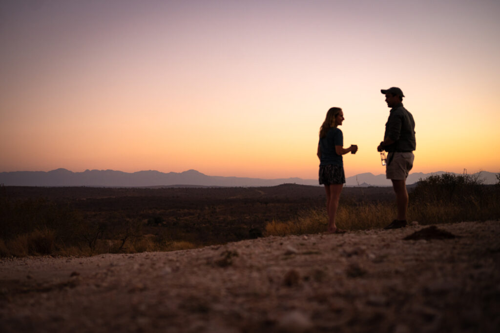 guests at sunset at africa on foot wilderness trails